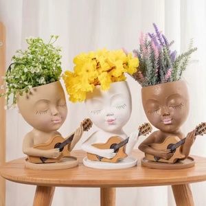 New.    Girl Blowing Design Flower Pot Ornament
